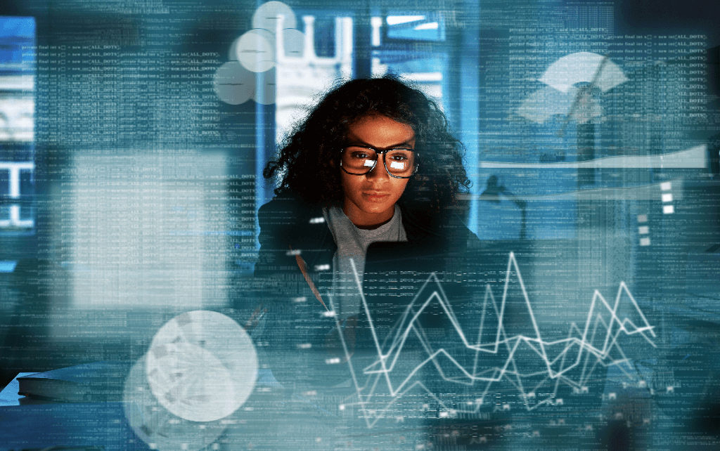 woman at computer with data related imagery